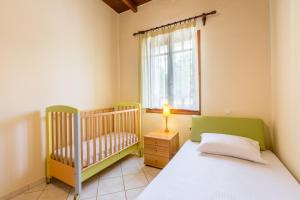 A bed or beds in a room at Femina