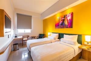 Letto o letti in una camera di Great Diponegoro Hotel Surabaya