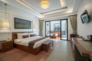 Voodi või voodid majutusasutuse The Tito Suite Residence toas