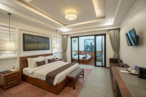 Voodi või voodid majutusasutuse The Tito Suite Residence toas