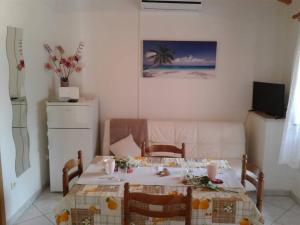 TV a/nebo společenská místnost v ubytování Apartment Romana