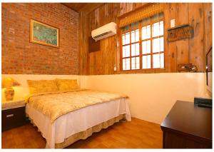 Cama o camas de una habitación en 初鹿敦親牧鄰民宿