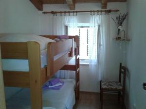 Postel nebo postele na pokoji v ubytování Apartment Romana