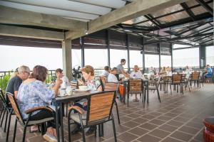 Restoran või mõni muu söögikoht majutusasutuses The Tito Suite Residence