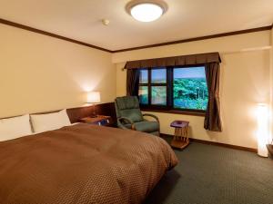 Letto o letti in una camera di Hotel Hotaka