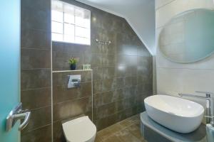 Koupelna v ubytování Eridon Suites