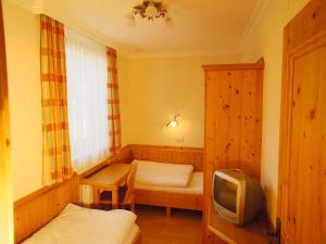 TV a/nebo společenská místnost v ubytování Appartement Haus Seer