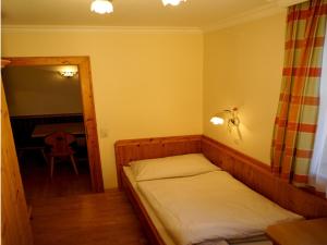 מיטה או מיטות בחדר ב-Appartement Haus Seer