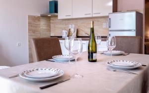 Kuchyň nebo kuchyňský kout v ubytování Apartments Marković