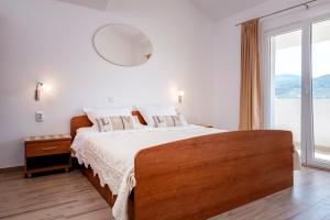 Postel nebo postele na pokoji v ubytování Apartments Marković