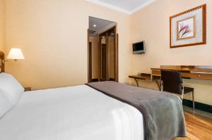 TV a/nebo společenská místnost v ubytování Hotel Julia