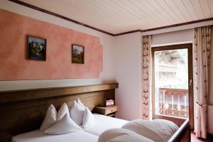 Posteľ alebo postele v izbe v ubytovaní Das Naturhotel die Eng