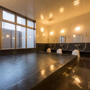 a large room with at Grand Park Hotel Odate in Odate