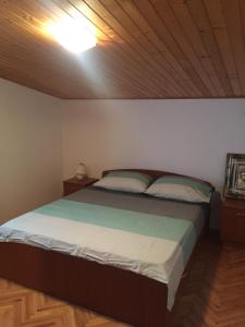 Postel nebo postele na pokoji v ubytování Apartment Meri