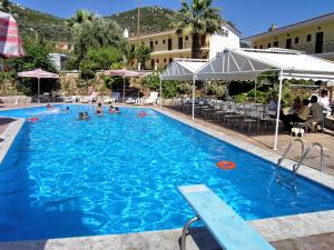 The swimming pool at or close to Mytilana Village Hotel