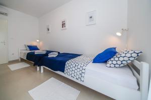 Postel nebo postele na pokoji v ubytování Guesthouse Klara