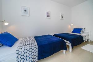 Postel nebo postele na pokoji v ubytování Guesthouse Klara