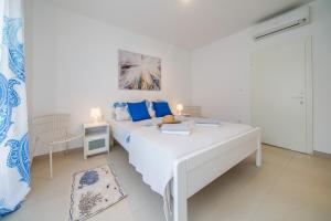 Postel nebo postele na pokoji v ubytování Guesthouse Klara