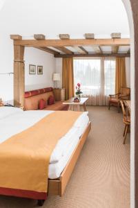 Postel nebo postele na pokoji v ubytování Soldanella by Hotel Adula