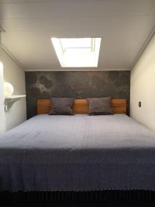 Katil atau katil-katil dalam bilik di Ferienhaus Witte Huuske