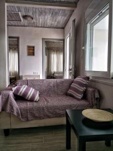 Кровать или кровати в номере Home by the sea