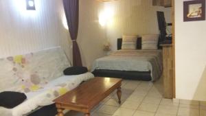 Postel nebo postele na pokoji v ubytování Auberge d'antan