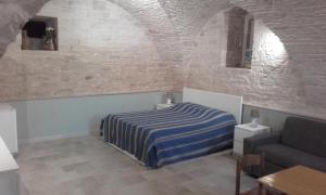 A bed or beds in a room at B&B la Palma