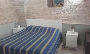 A bed or beds in a room at B&B la Palma