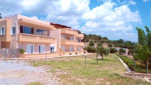 a villa with a view of a building at Creta Spirit in Plakias