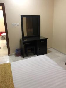 Postel nebo postele na pokoji v ubytování Safwt Aldyar Furnished Units