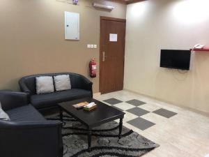 TV a/nebo společenská místnost v ubytování Safwt Aldyar Furnished Units