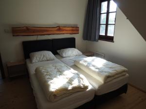 Postel nebo postele na pokoji v ubytování Vakantie huis Dum Oenter