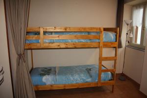 ヴェルバーニアにあるNina & Bertoの二段ベッド2組が備わる客室です。