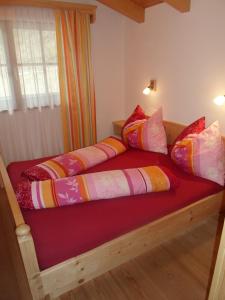 A bed or beds in a room at Ferienwohnung Steiner