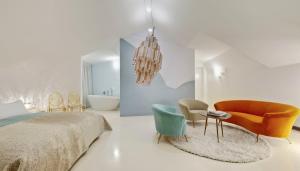 Postel nebo postele na pokoji v ubytování Boutique Hotel Imperialart