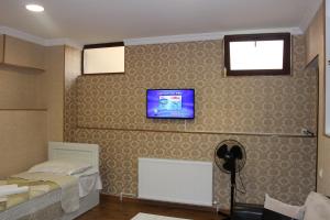 Letto o letti in una camera di Hotel Rabath