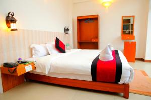 Rúm í herbergi á Hotel City Inn - Mountain View
