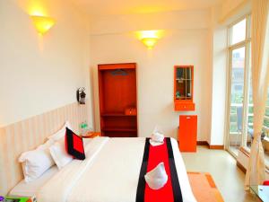 Rúm í herbergi á Hotel City Inn - Mountain View