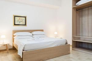 Postel nebo postele na pokoji v ubytování Casa da Ida