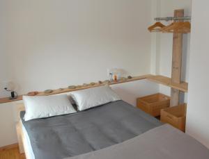 Letto o letti in una camera di Ferienwohnung Troegligasse