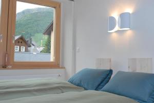 Postel nebo postele na pokoji v ubytování Ferienwohnung Troegligasse