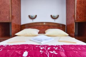 Postel nebo postele na pokoji v ubytování Hotel Grbalj