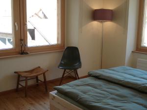 Letto o letti in una camera di Ferienwohnung Troegligasse
