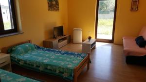 Rúm í herbergi á Apartment Stanko