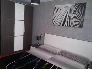 Posteľ alebo postele v izbe v ubytovaní Piso céntrico, amplio, luminoso y familiar, con garaje según disponibilidad