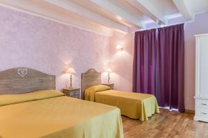 Voodi või voodid majutusasutuse B&B Apollo toas