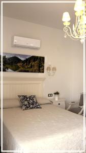 Posteľ alebo postele v izbe v ubytovaní Centro Malaga Atico Valdeazores gran terraza privada