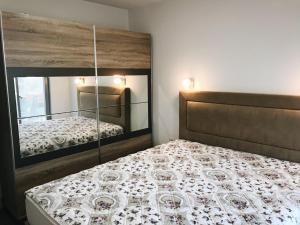 Posteľ alebo postele v izbe v ubytovaní Apartmani Belma