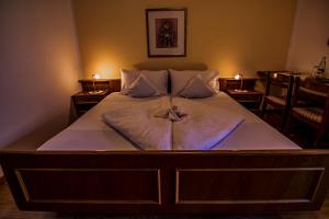 Postel nebo postele na pokoji v ubytování Hotel Gasthof WASTL