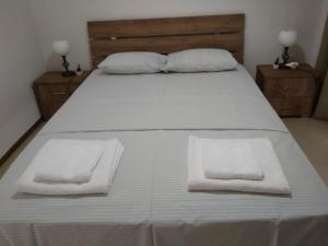 Postel nebo postele na pokoji v ubytování Gorginas Home